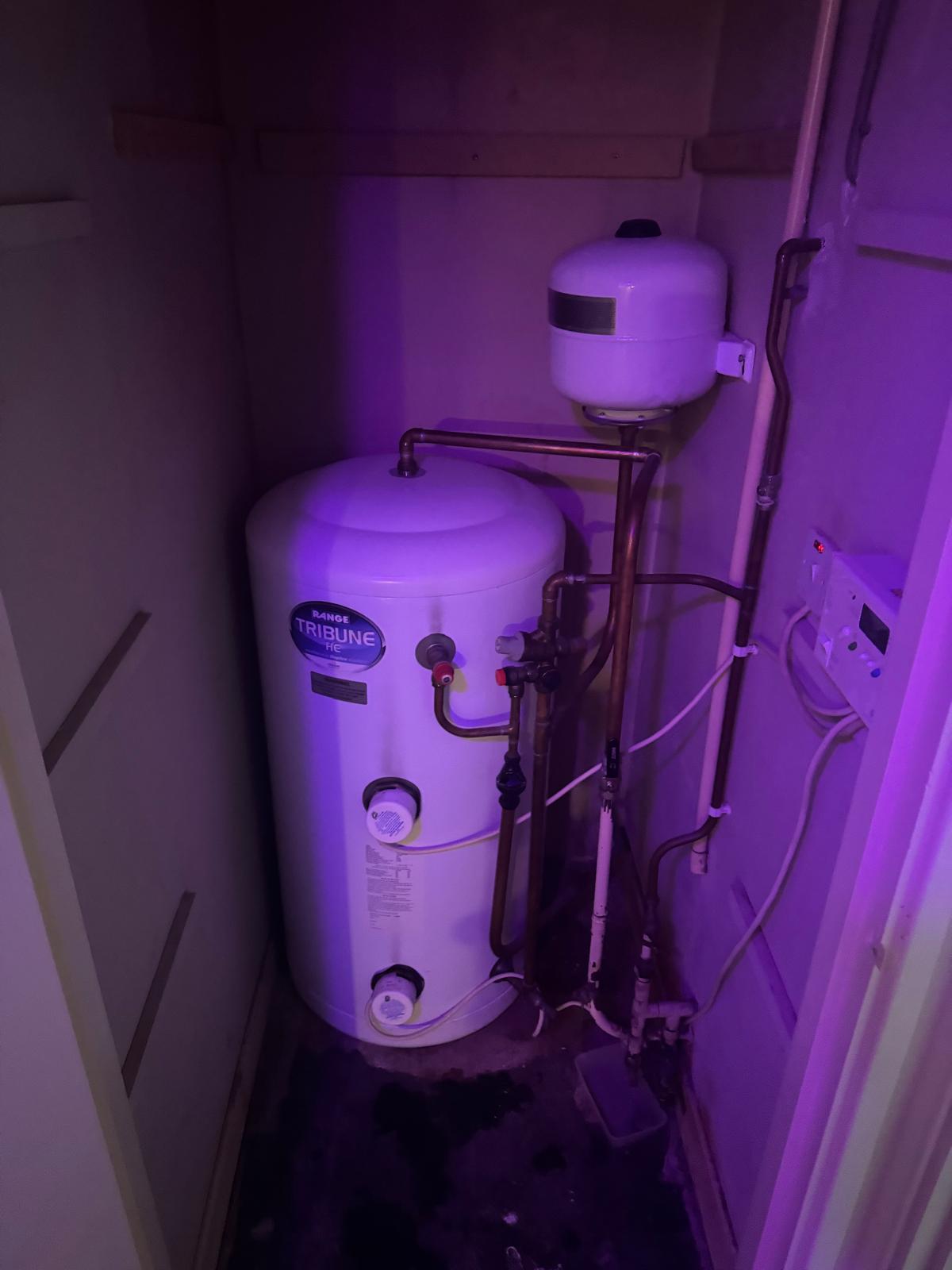 Ideal Instinct hot water cylinder installation in a Leicestershire garage by Reactive