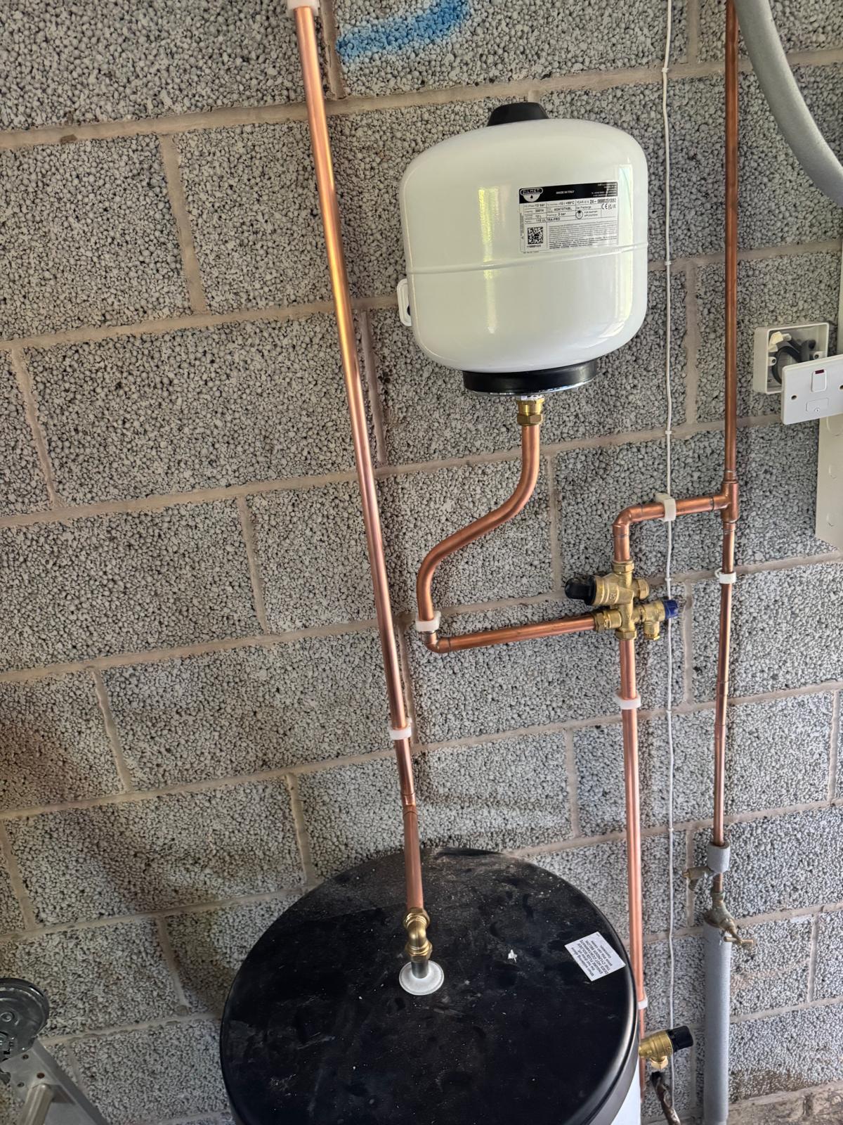 Expansion vessel and copper pipework installation in progress by Reactive engineers